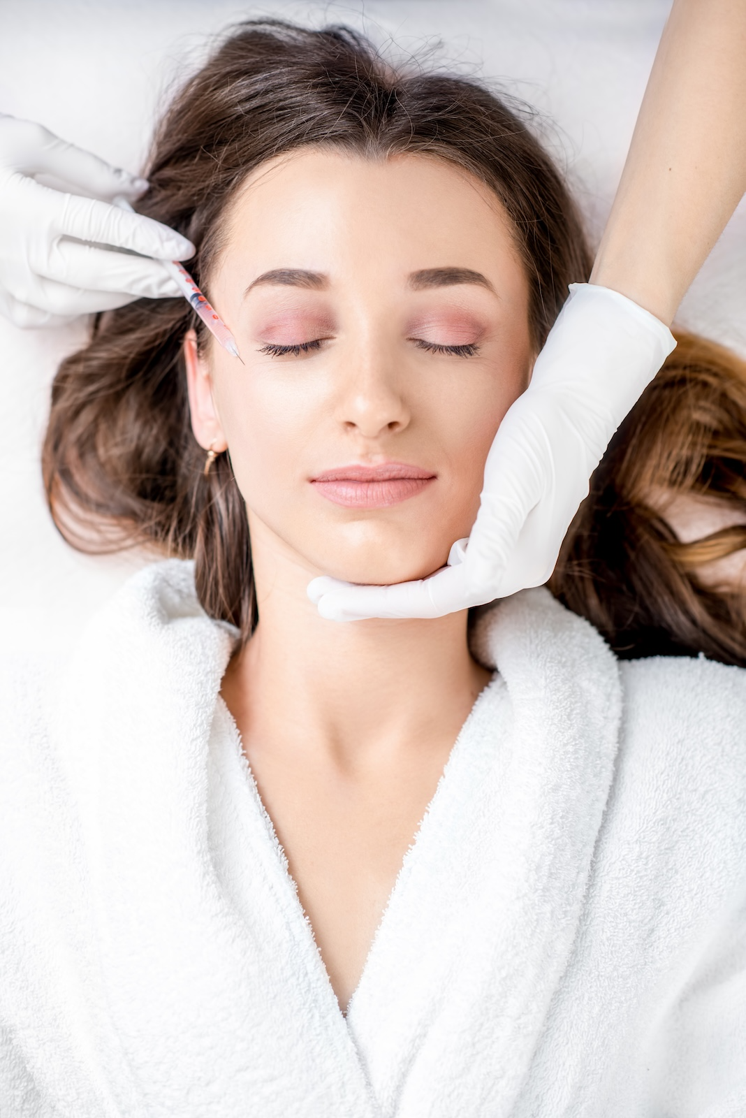 woman receiving botox injections